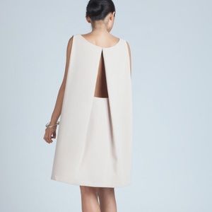 Kaarem tyh.d boatneck open back dress in cream.